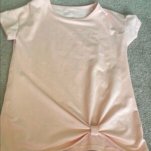 Girls all in motion athletic light orange shirt